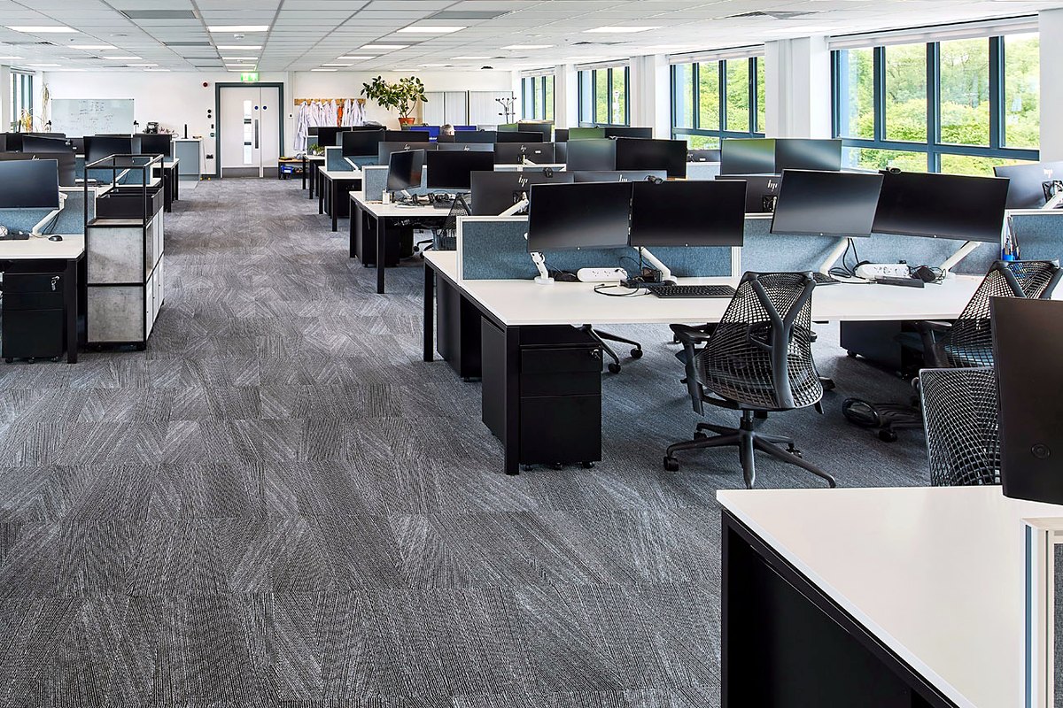 Open-plan office with rows of desks